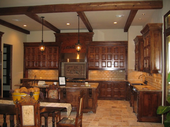 Award Winning Bellaire Showcase Home 2005, custom kitchen cabinetry, floors are reclaimed pavers from French villa, built by Watermark Builders.